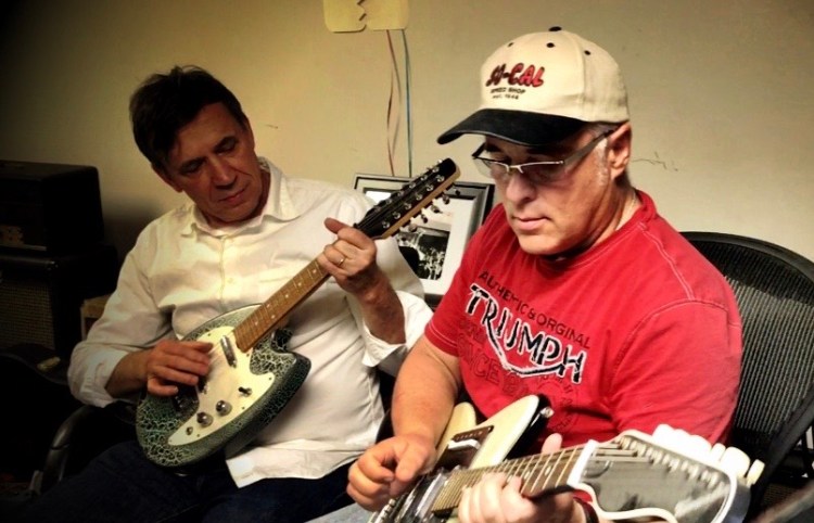 Devo Bob1 and Sherman playing guitar